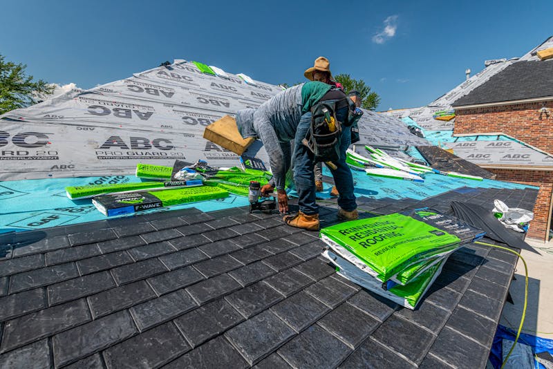 installing roof shingles